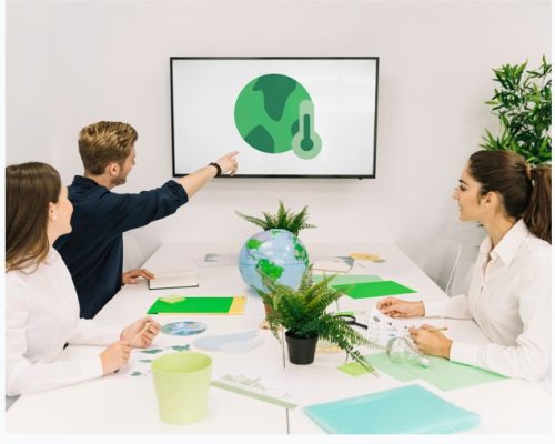 Free Photo Businessman showing global warming icon to his colleagues on screen - Google Chrome